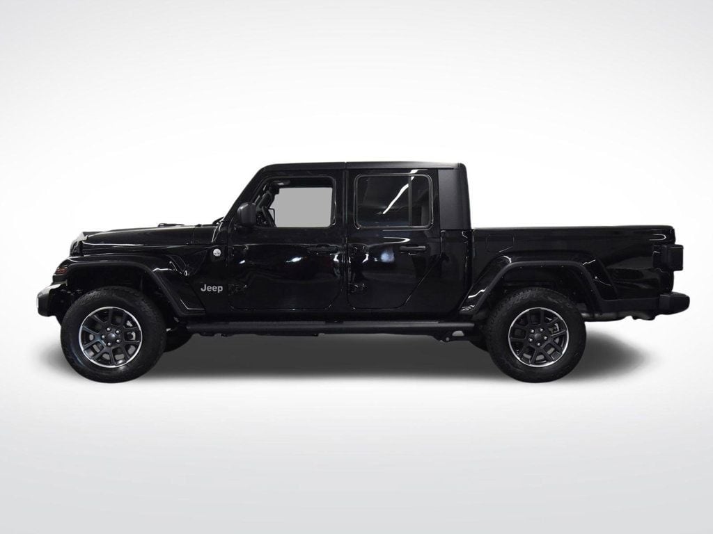 Used 2022 Jeep Gladiator Overland with VIN 1C6HJTFG8NL168942 for sale in Coral Gables, FL