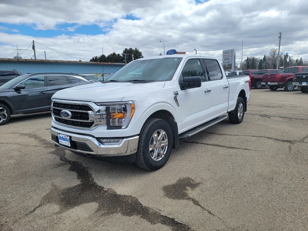 Used 2022 Ford F-150 XLT with VIN 1FTFW1E82NKD23023 for sale in Minot, ND