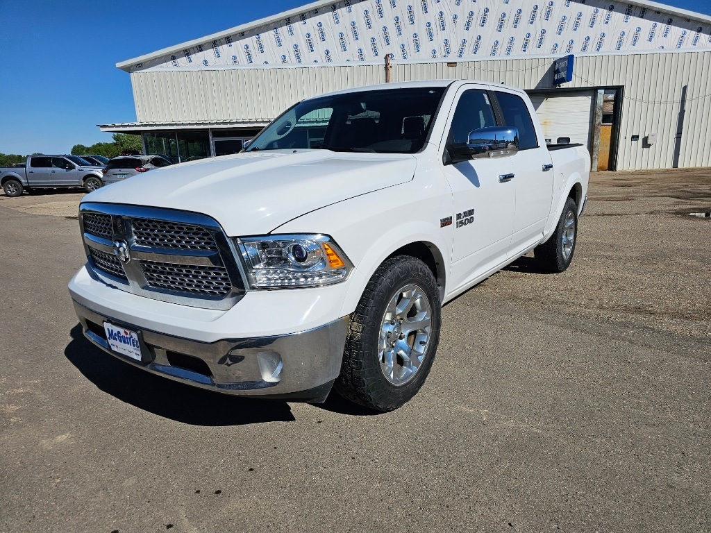 Used 2015 RAM Ram 1500 Pickup Laramie with VIN 1C6RR7NT0FS546696 for sale in Minot, ND