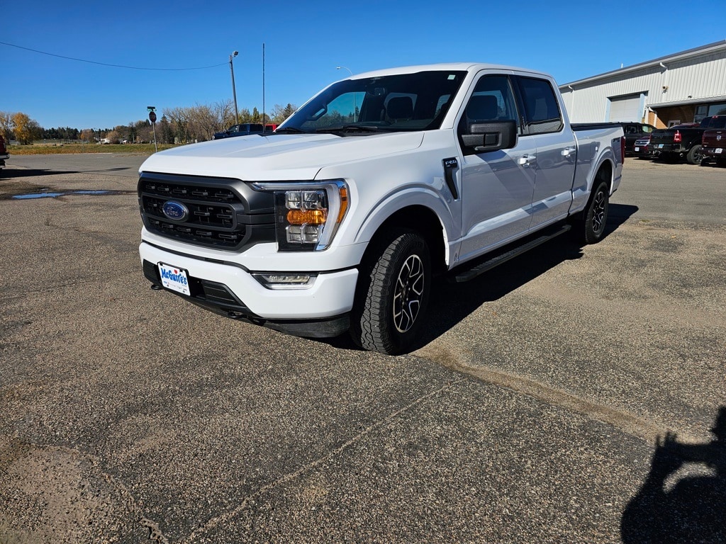 Used 2021 Ford F-150 XLT with VIN 1FTFW1E80MFC80647 for sale in Minot, ND