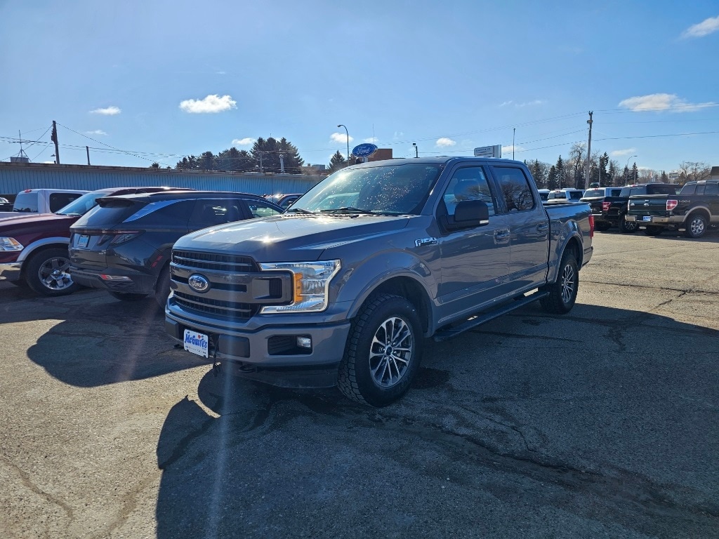 Used 2019 Ford F-150 XLT with VIN 1FTEW1E58KFB04153 for sale in Minot, ND