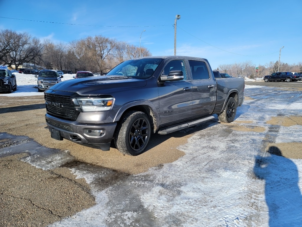 Used 2021 RAM Ram 1500 Pickup Laramie with VIN 1C6SRFRT2MN592435 for sale in Minot, ND