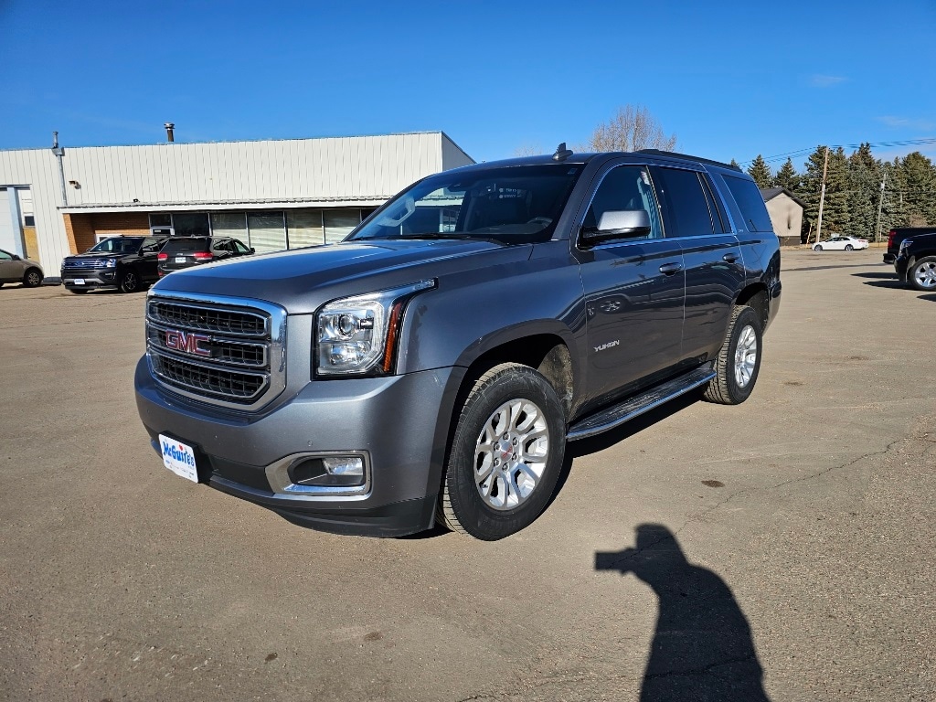 Used 2020 GMC Yukon SLT with VIN 1GKS2BKC3LR270933 for sale in Minot, ND