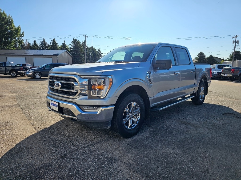 Used 2022 Ford F-150 XLT with VIN 1FTFW1E84NKD91128 for sale in Minot, ND