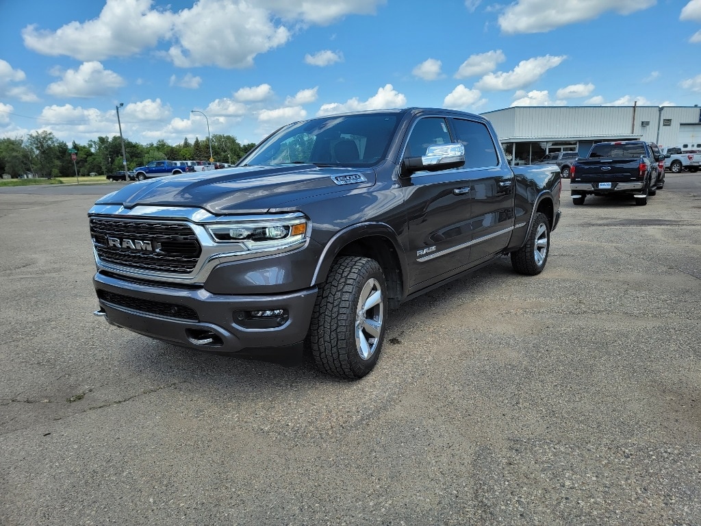 Used 2022 RAM Ram 1500 Pickup Limited with VIN 1C6SRFPT7NN142719 for sale in Minot, ND