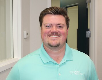 Staff member Ty Riley from ID_7ed6b7696d4e