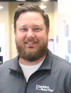 Staff member Aaron Maddux from ID_a6809f7ec4cb