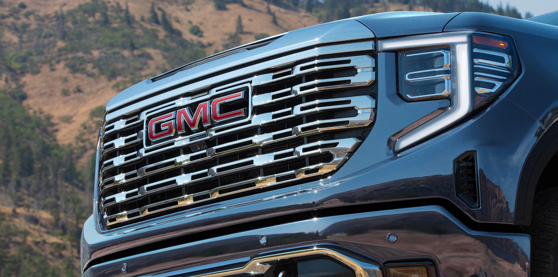Close-up of a GMC truck grille Close-up of a GMC truck grille