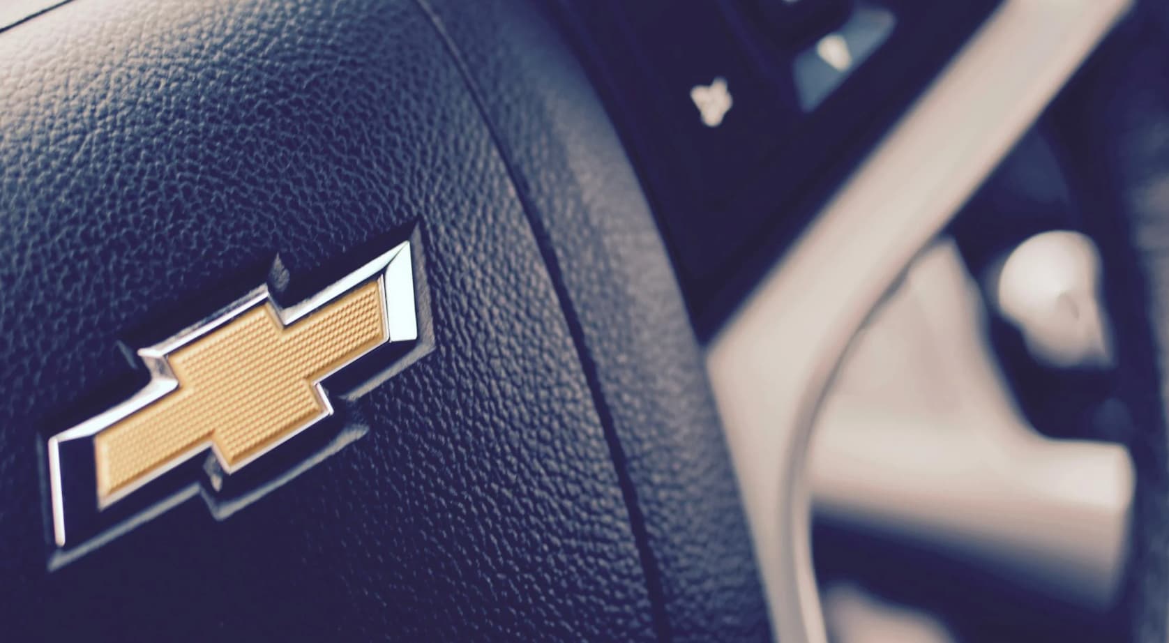TITLE Close up of a chevy steering wheel