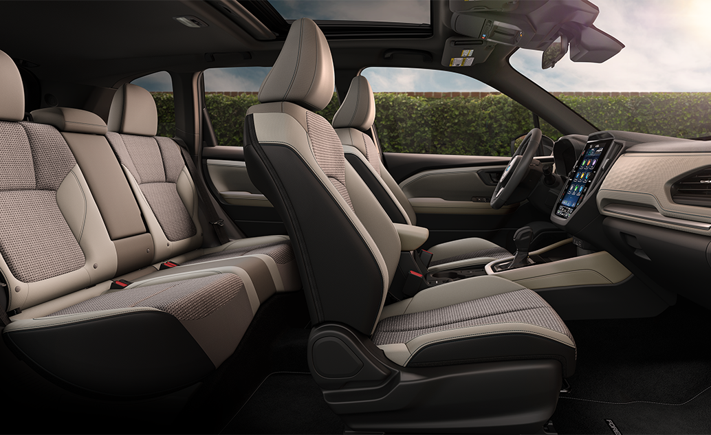  Person cheerfully signing documents.