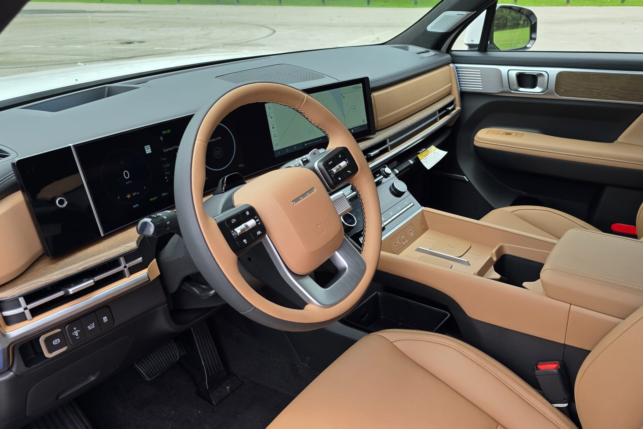  Person cheerfully signing documents.