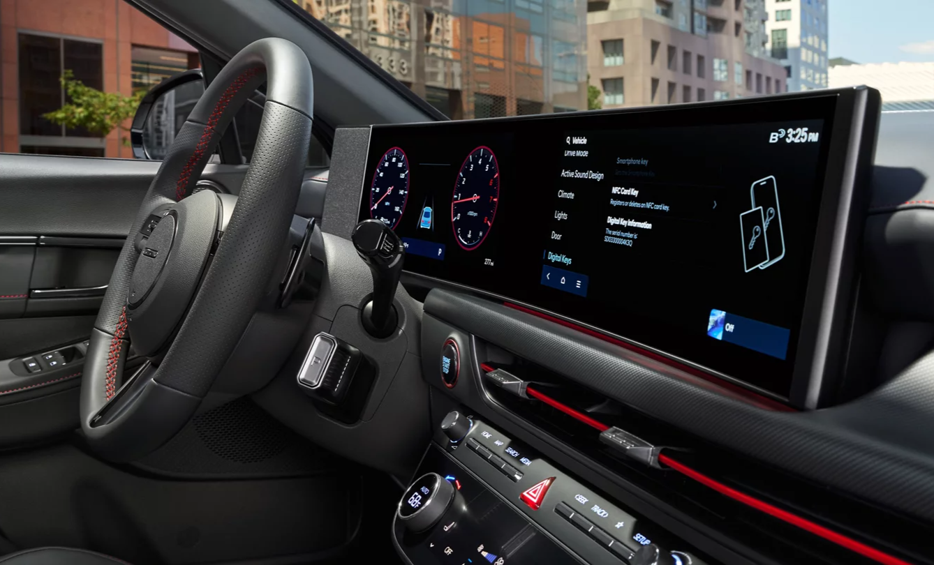  Person cheerfully signing documents.