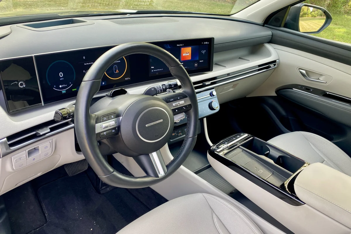  Person cheerfully signing documents.