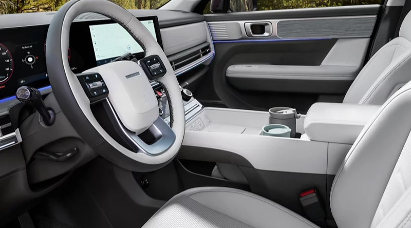  Person cheerfully signing documents.