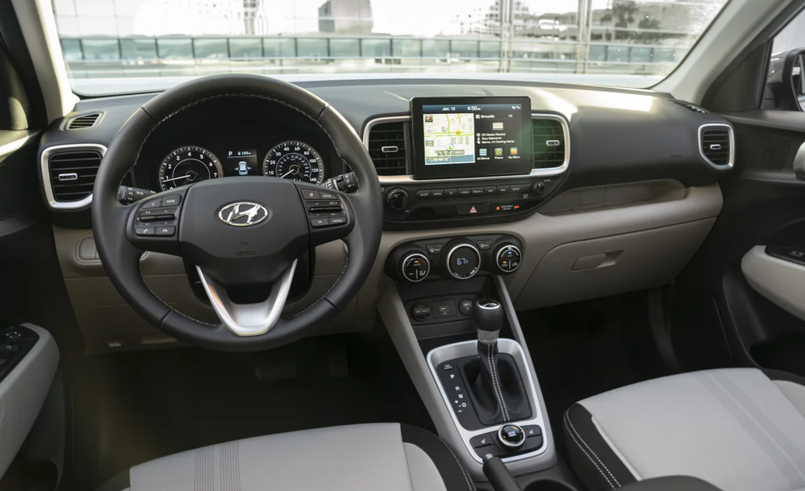  Person cheerfully signing documents.