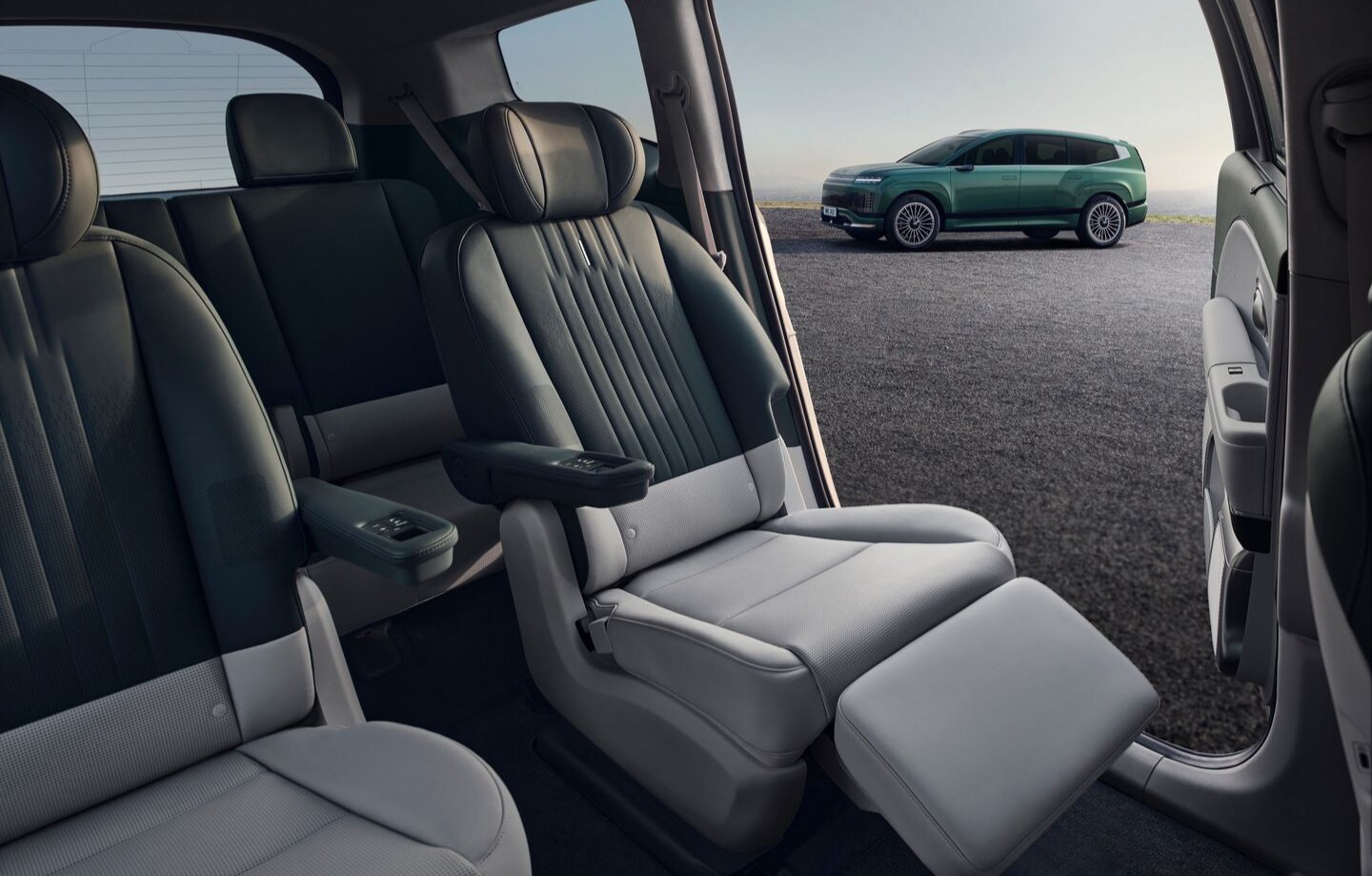  Person cheerfully signing documents.