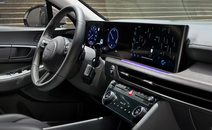  Person cheerfully signing documents.