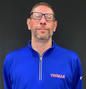 Staff member Andy Baker from 5781e9c57ed4