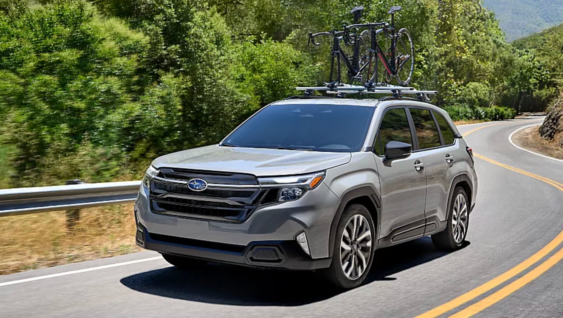 2024 Subaru Forester driving on the highway