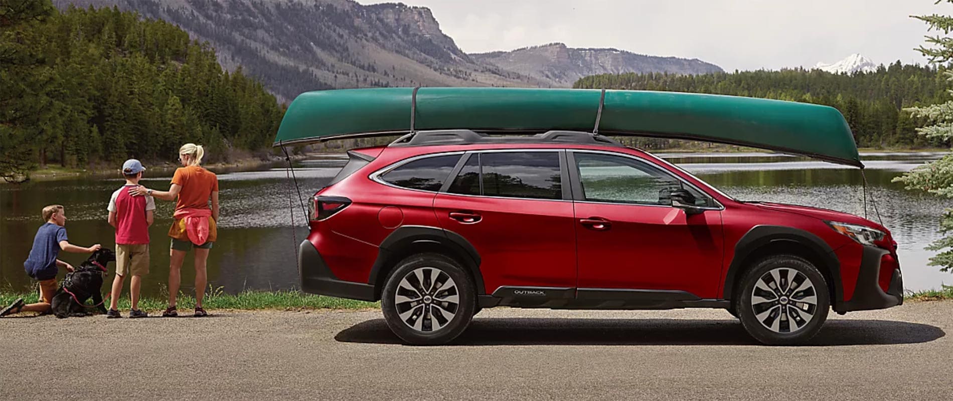 Subaru Specials Available in Bedford, PA New Subaru Outback near a lake with a Canoe