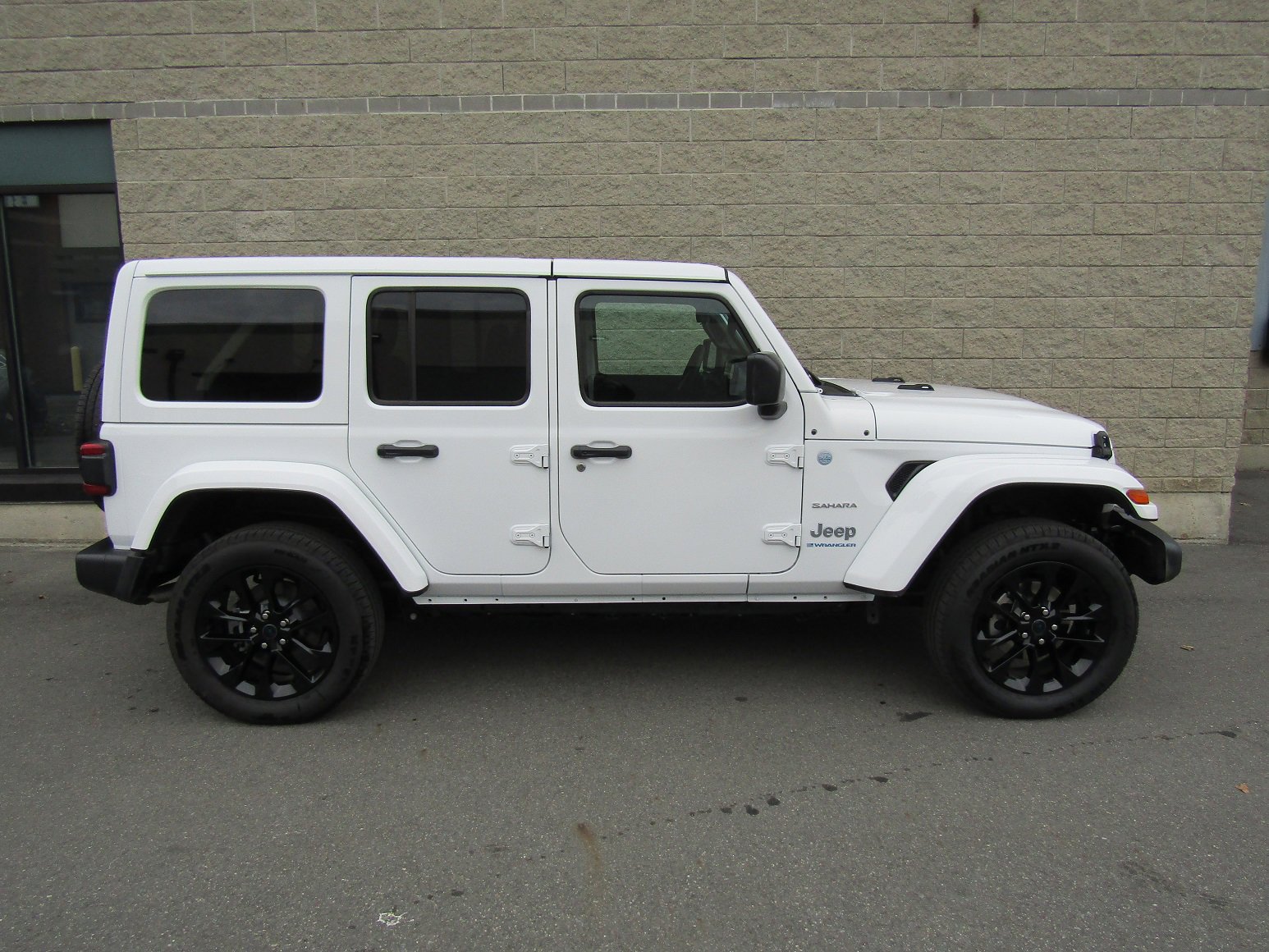 Used 2024 Jeep Wrangler 4xe Sahara 4XE with VIN 1C4RJXP62RW146367 for sale in Waterville, ME