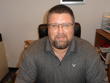 Staff member Jason Praus from ID_3e96c7cbf343