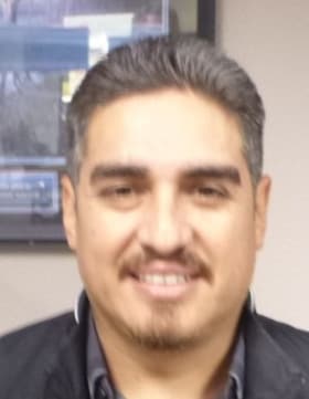 Staff member Octavio Diaz from 14cbe63677b9