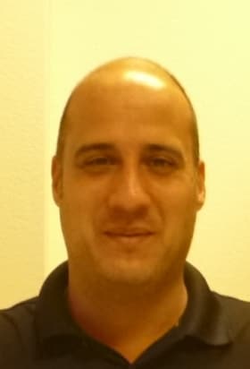 Staff member Adan "AC" Cabada from 8fa8d2ebc44d