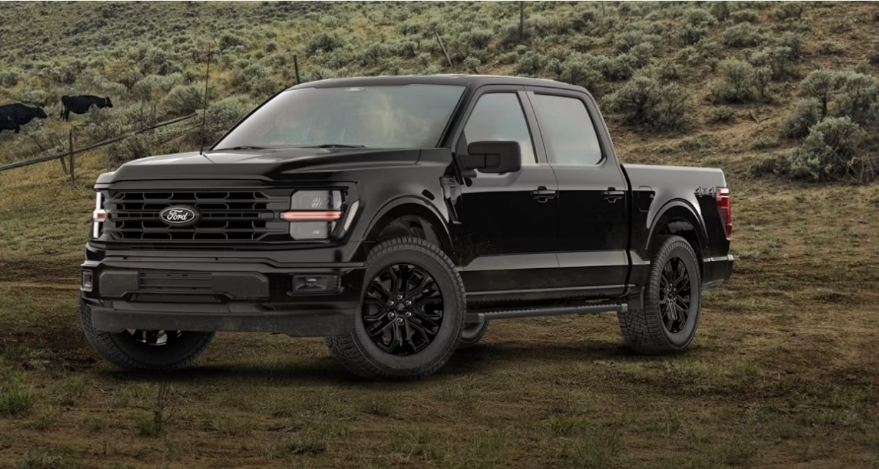  Person cheerfully signing documents.