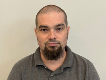 Staff member Adam Lynn from ID_ef1c7357edd1