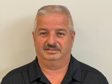 Staff member Ron Crowe from ID_ef1c7357edd1