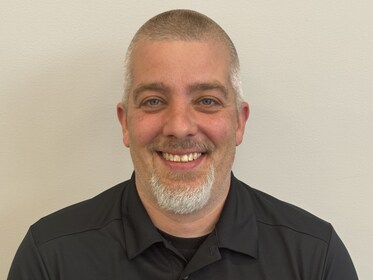 Staff member Adam Hartman from ID_62a67a2584a0