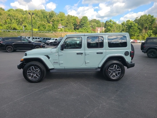 Used 2024 Jeep Wrangler 4-Door Sahara with VIN 1C4PJXEG2RW235200 for sale in Cumberland, MD