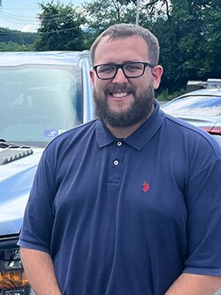 Staff member Tyler Iser from ID_a8fc1ccb155a