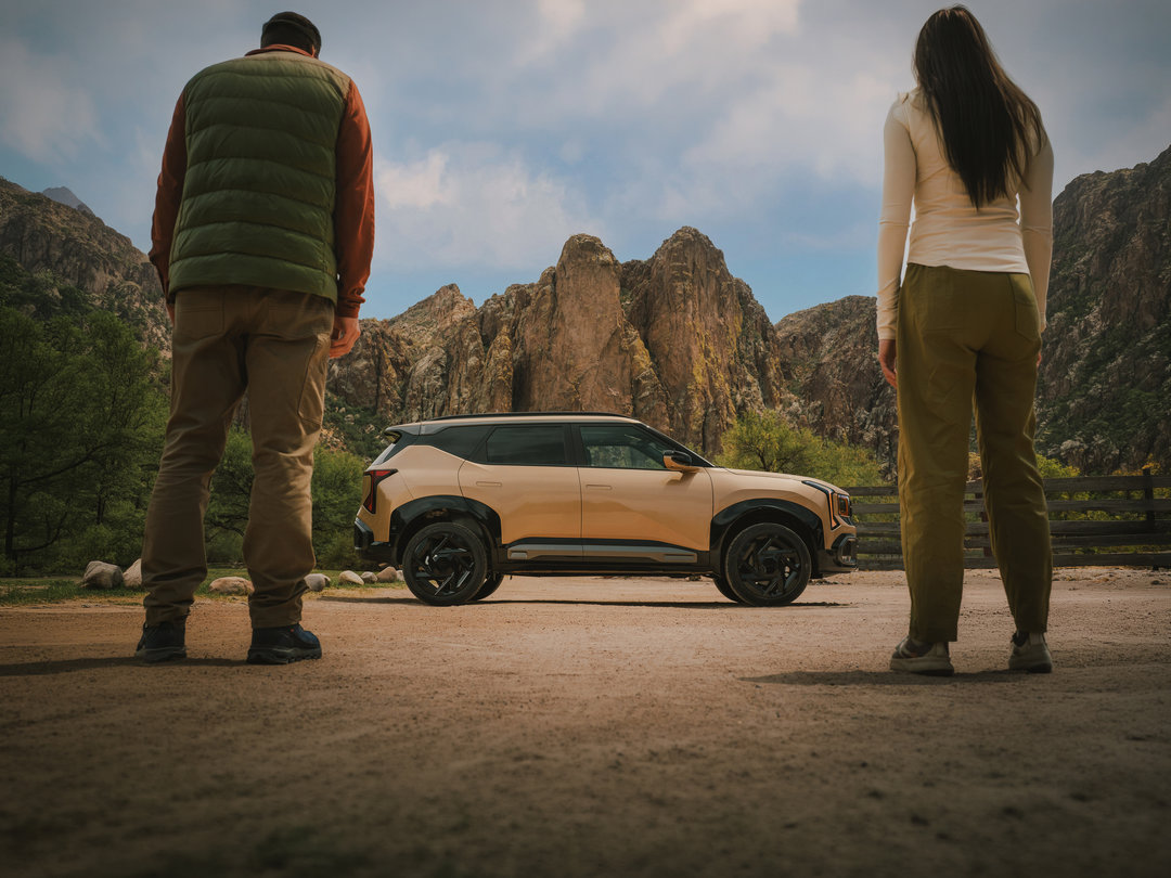 2027 Kia Seltos Exterior design of Kia Seltos near of two people