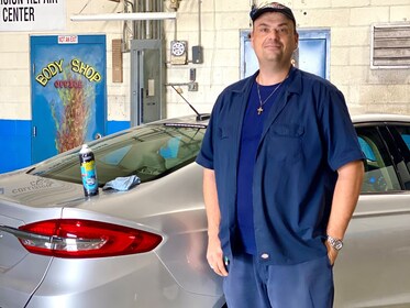 Staff member Brandon Gank from 55a3f711a2bc