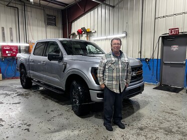 Staff member Mike Welch from 55a3f711a2bc