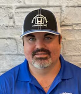 Staff member Bradley Kimrey from ID_199123