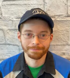 Staff member Brian Carpenter from ID_829283