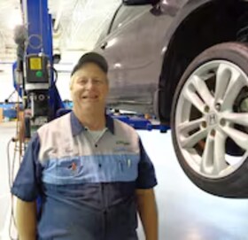 Staff member Gary Burleson from ID_829283