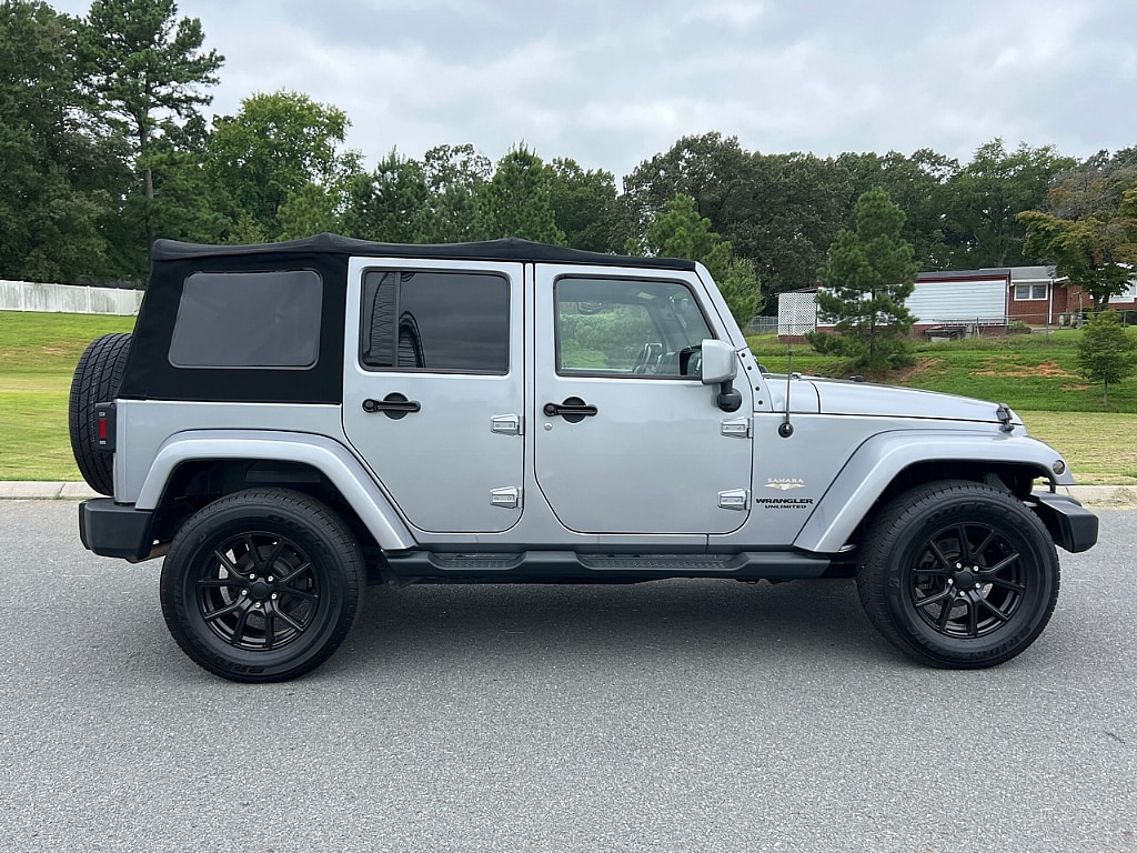 Used 2014 Jeep Wrangler Unlimited Sahara with VIN 1C4BJWEG7EL265728 for sale in Albemarle, NC