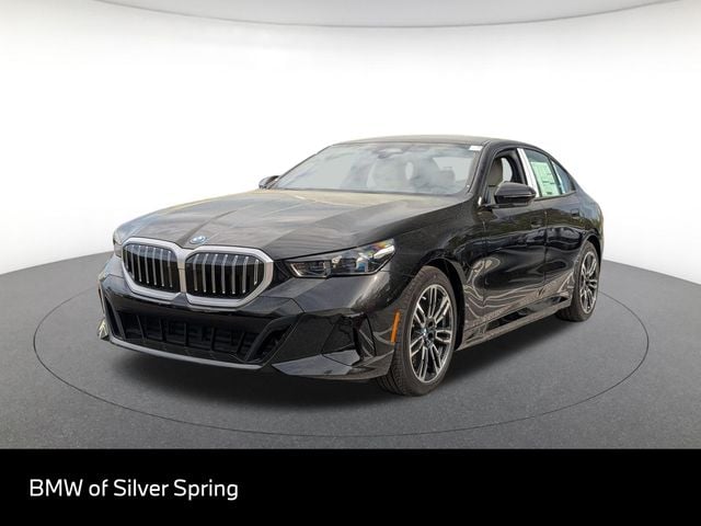 2026 BMW 5 Series 550e xDrive Sedan's photo