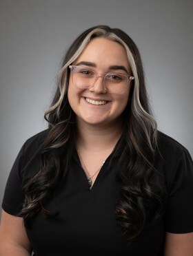 Staff member Allyson from ID_a839f7