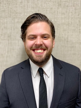 Staff member Joshua Adams from 5b956b858099