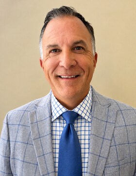 Staff member Tom Hammond from 5b956b858099