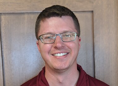 Staff member Elliott Mueller from ID_81a3b8bc10bf