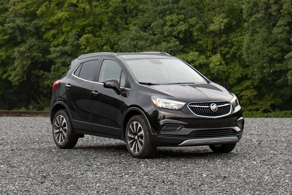 Black 2022 Buick Encore parked on a gravel road