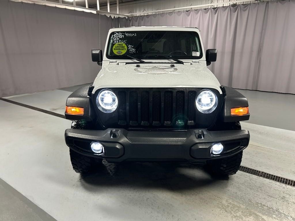 Used 2021 Jeep Wrangler Unlimited Willys with VIN 1C4HJXDN4MW774124 for sale in Lima, OH