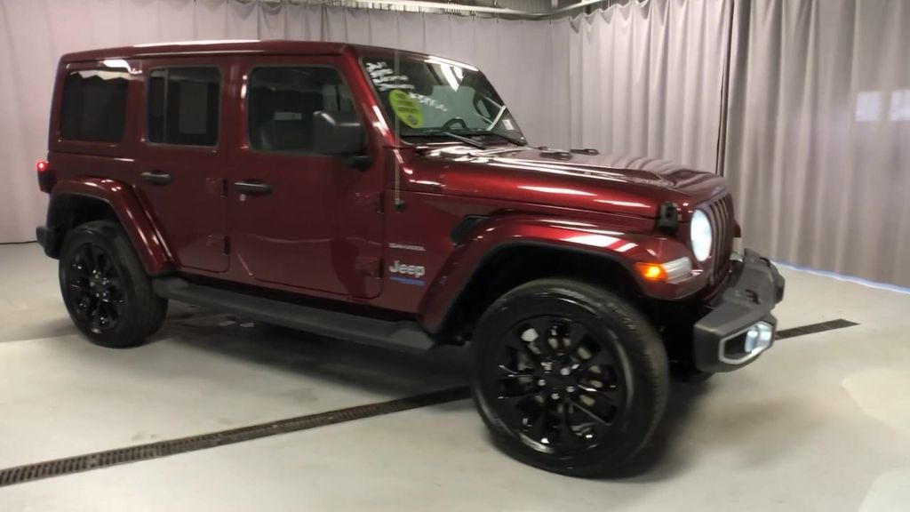 Used 2021 Jeep Wrangler Unlimited Sahara 4XE with VIN 1C4JJXP67MW729054 for sale in Lima, OH