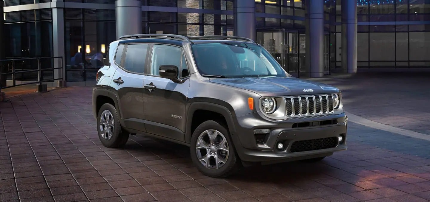 Gray 2023 Jeep Renegade parked near a downtown city area